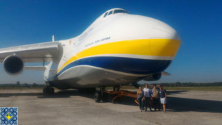 Antonov Plant Tour | Aviation Enthusiasts from Germany, Estonia and Canada in front of Antonov AN-124 Ruslan