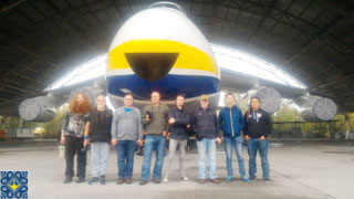 Antonov Plant Tour | Aviation Enthusiasts from USA, Netherlands, China, Ireland, Czech Republic in front of Antonov AN-124 Ruslan