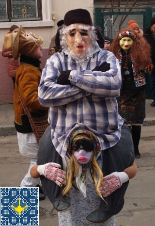 Malanka Festival 2014 in Chernivtsi | Man on shoulders of a women