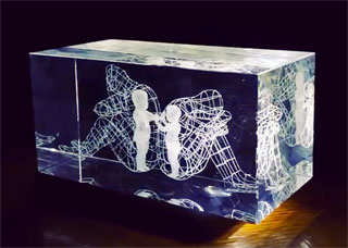 Alexander Milov created LOVE Souvenir placing LOVE Sculpture in a glass crystal