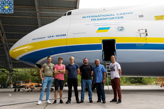 Antonov Plant Tour | Aviation Enthusiasts in front of Antonov AN-124 Ruslan